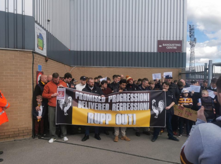 Bradford City fans chant in protest against owners before game
